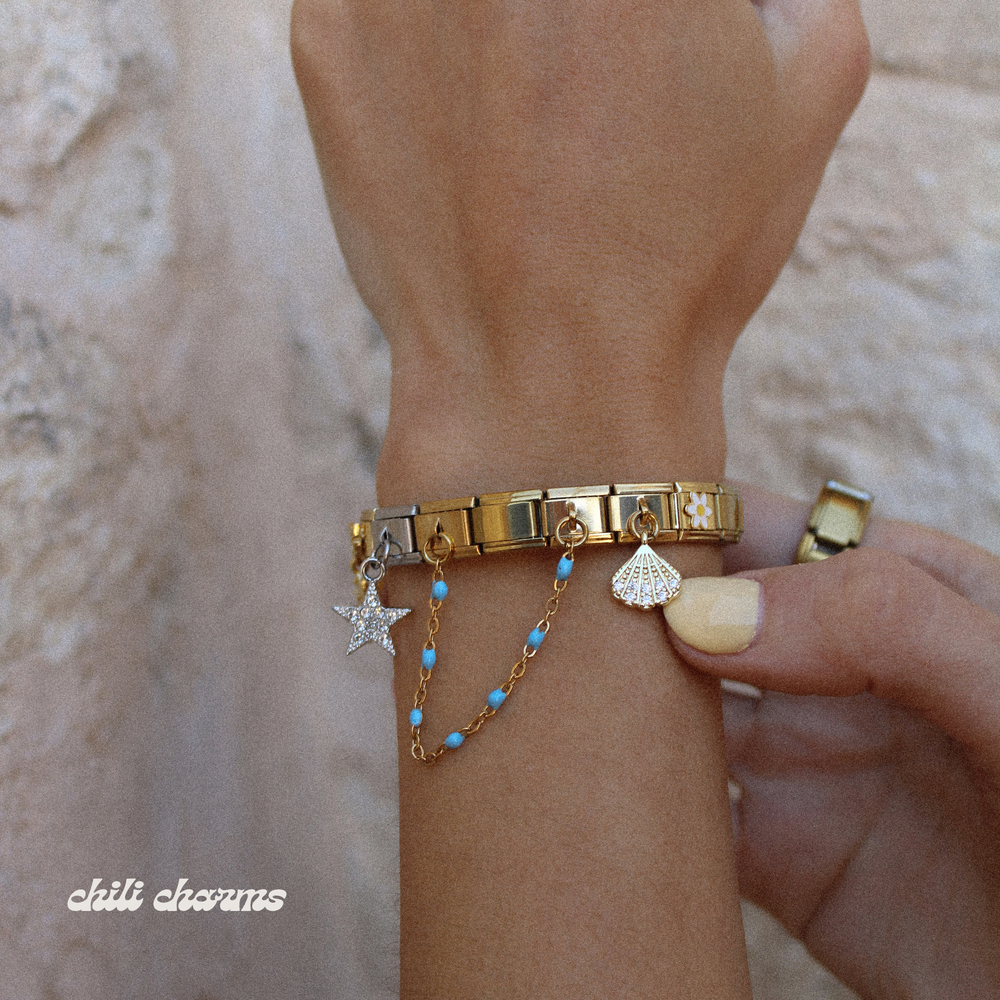 Charm de estrella de plata